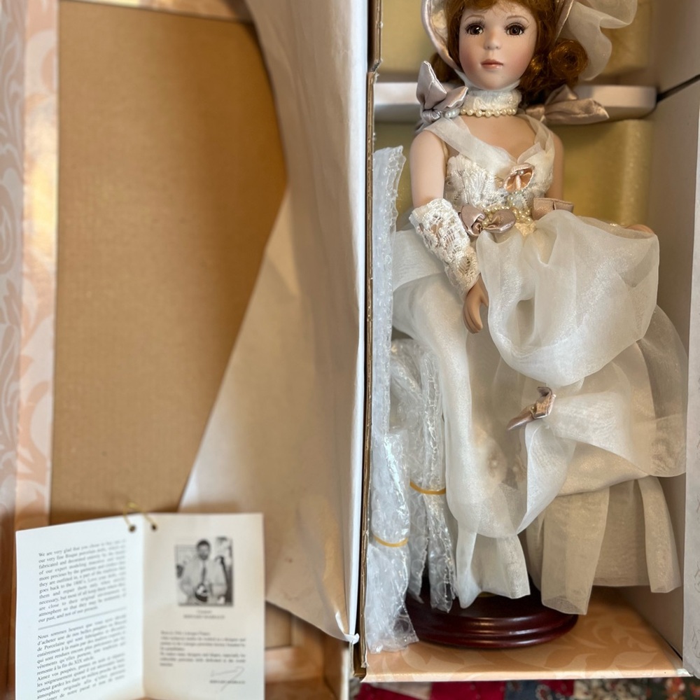 Elegant White Porcelain Doll
